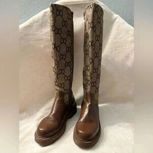Rogue platform knee high zippered boots EUC
Women’s size 7.5